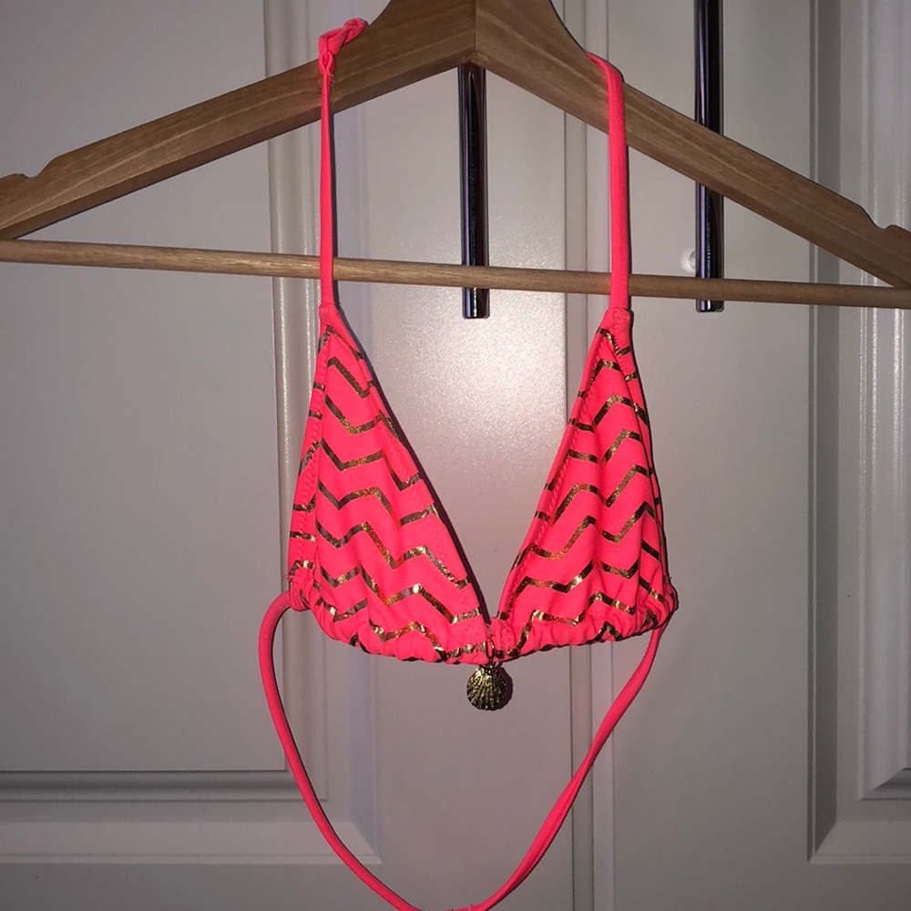 Bright pink and gold bathing suit top